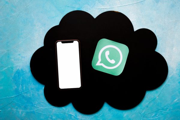 smartphone-media-icon-black-cloud-painted-blue-wall